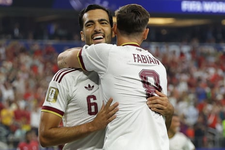 Mikel Merino is embraced by Fabián Ruiz after his late winner for Spain against Portugal. Photograph